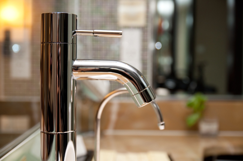 Leaking tap being repaired in Dulwich